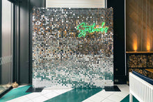Load image into Gallery viewer, Corporate event photo wall featuring a silver shimmer backdrop