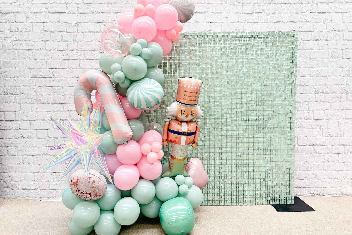 Mint green shimmer wall backdrop adding a chic and modern touch to weddings and special occasions