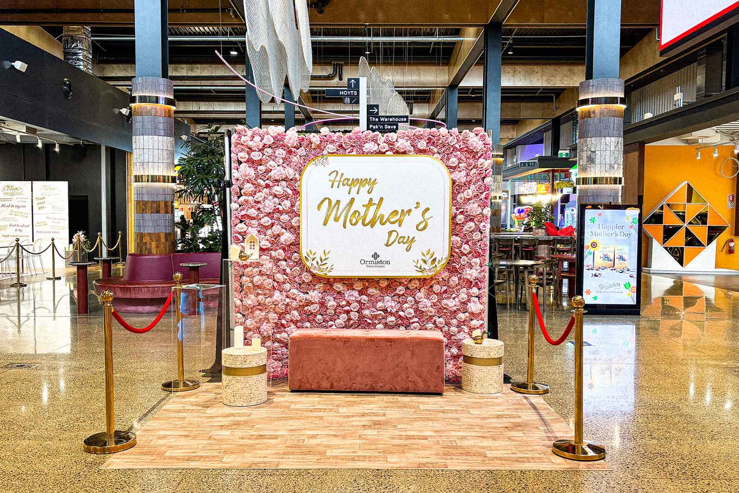 Pink flower wall backdrop for hire for events and photo booths