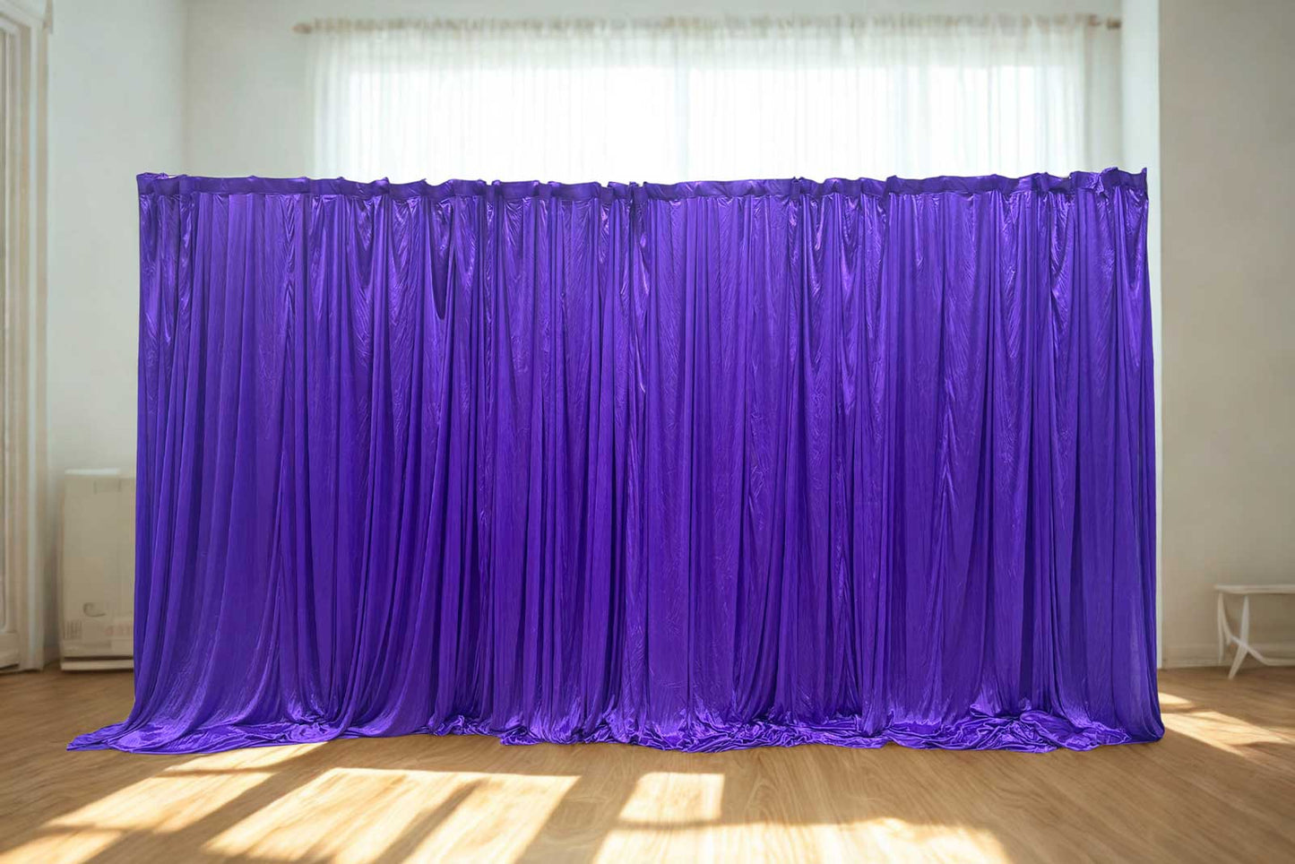 Purple backdrop curtain hire for parties, weddings, and stylish event décor