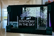 Load image into Gallery viewer, Silver shimmer wall backdrop styled for a corporate event