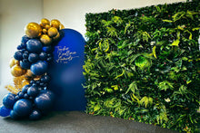 Load image into Gallery viewer, Tropical backdrop wall with custom arch and balloon garland for event styling.