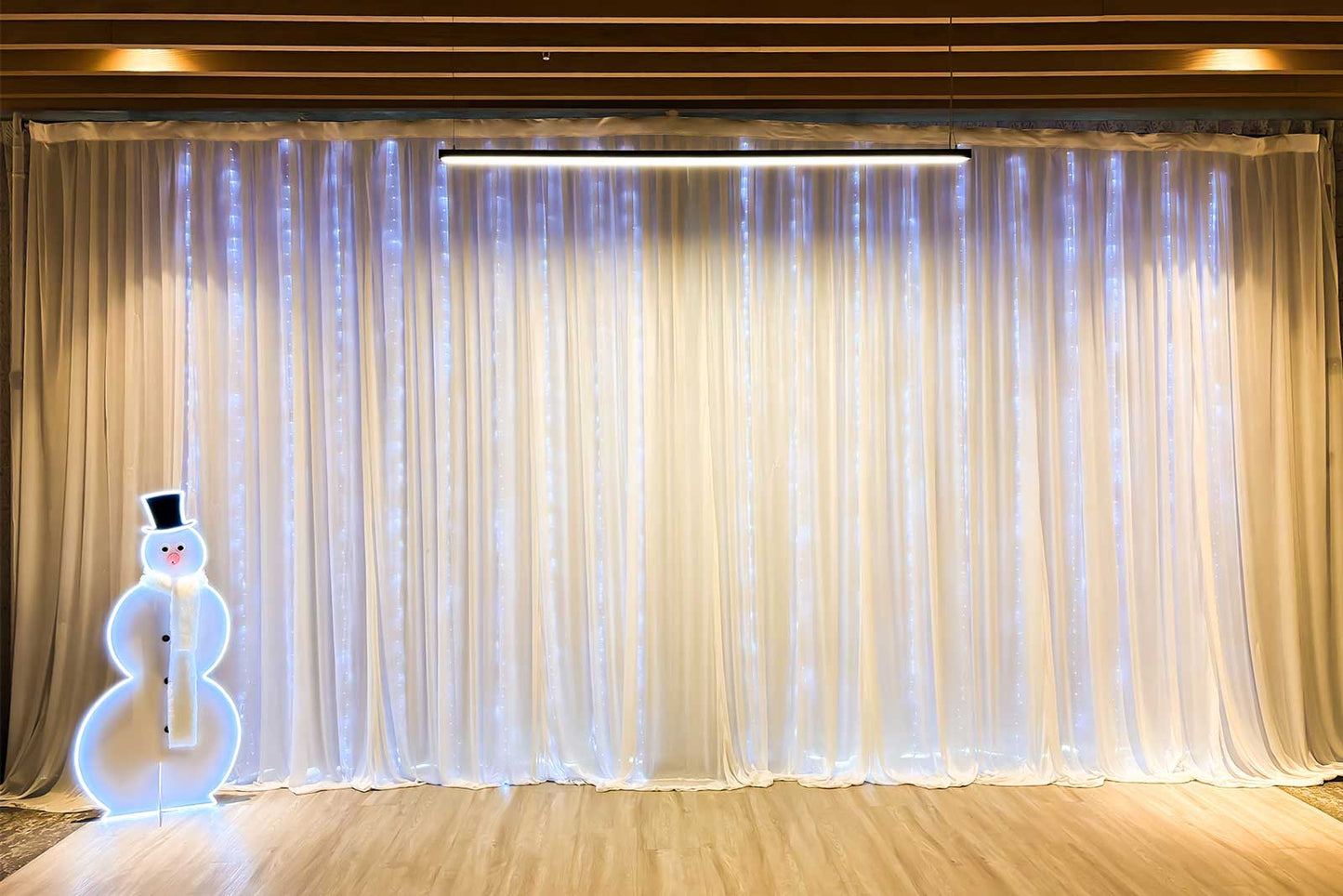 White curtain backdrop for hire to create clean and stylish photo areas at events