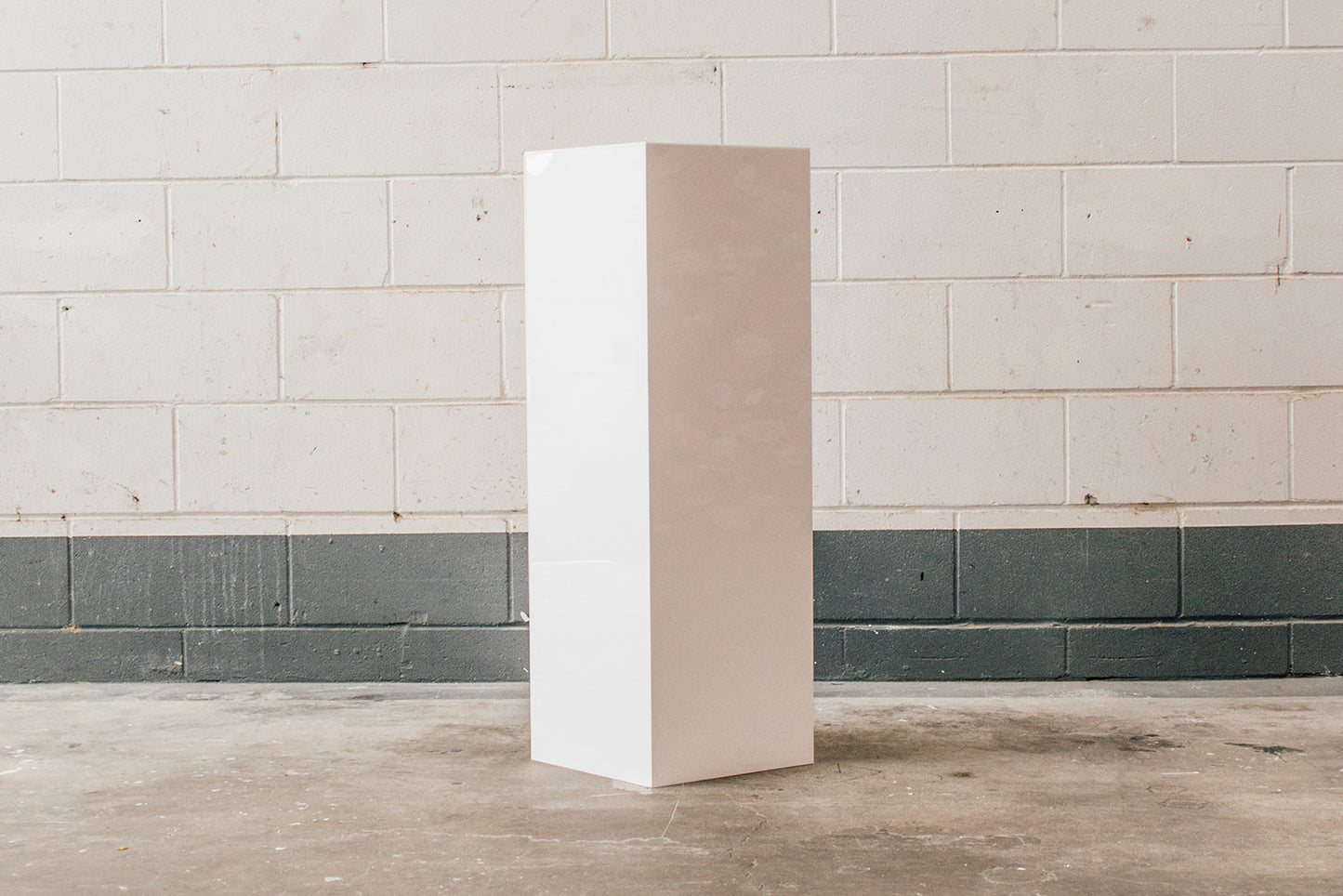 Event plinth hire NZ styled for balloons, cakes, and signage