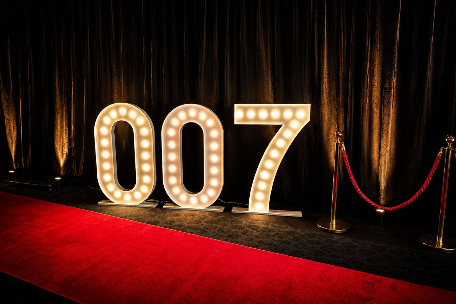 007 marquee lights creating a stylish James Bond themed display for a corporate event