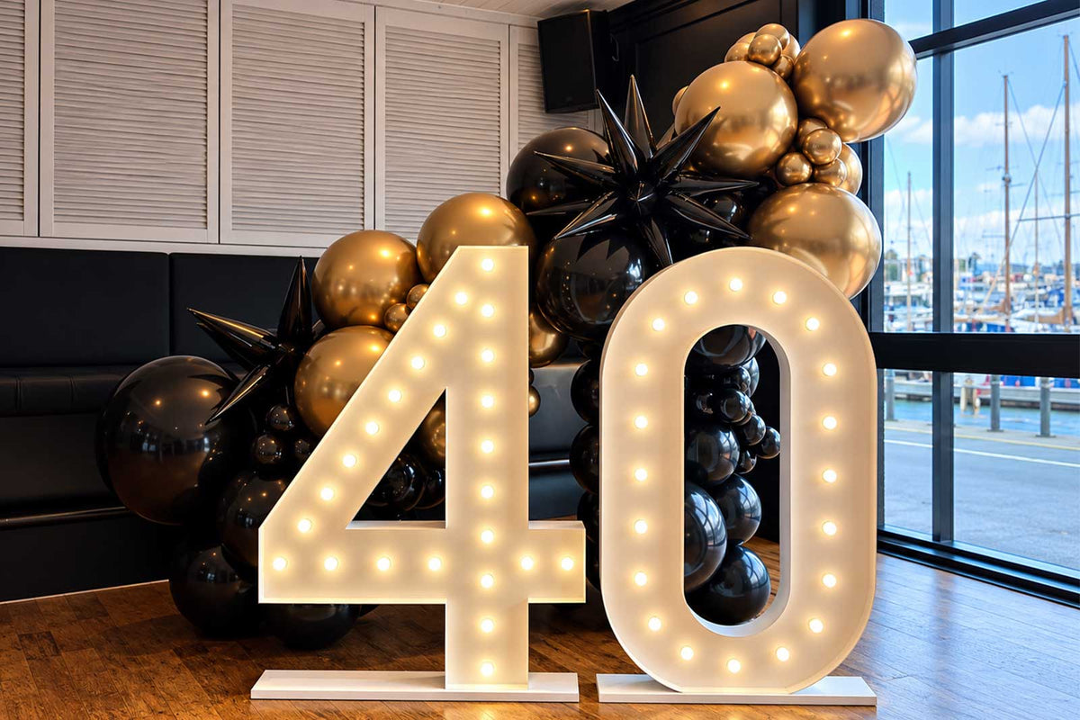 40 marquee lights with a balloon installation for a statement event display, perfect for birthdays, celebrations and corporate events.