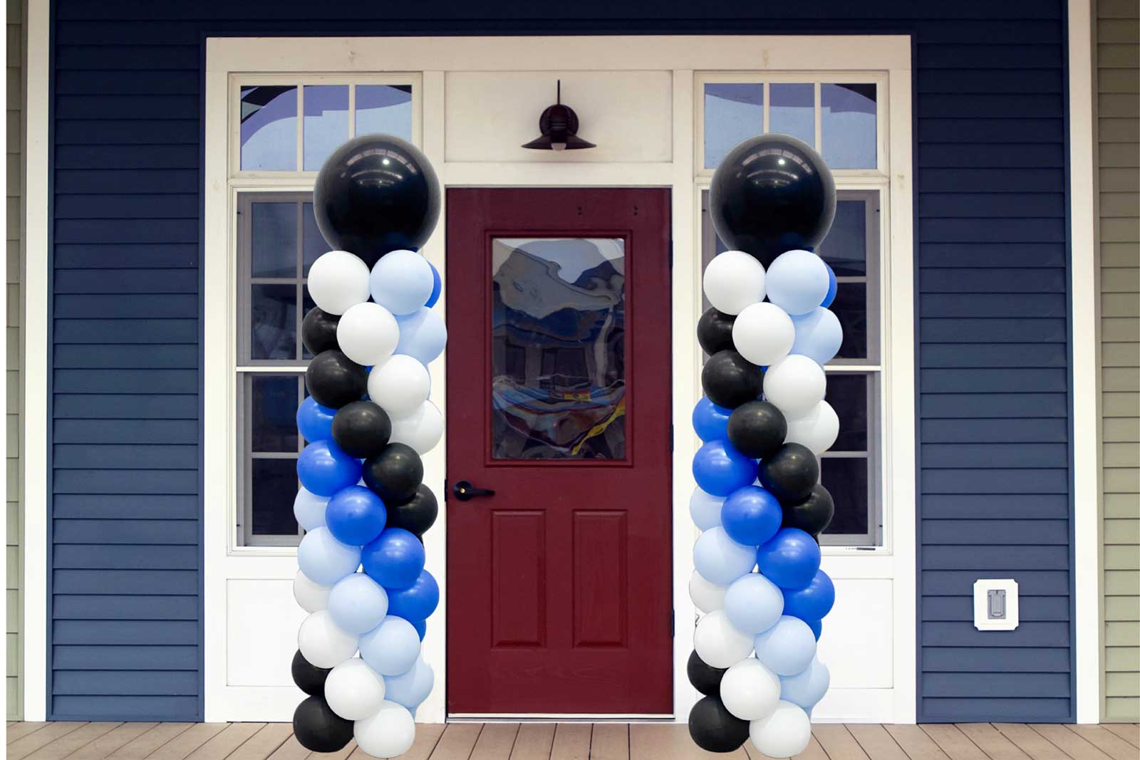 Freestanding balloon column for Auckland birthdays and events, styled by MBP-certified Mad Dog Backdrops.