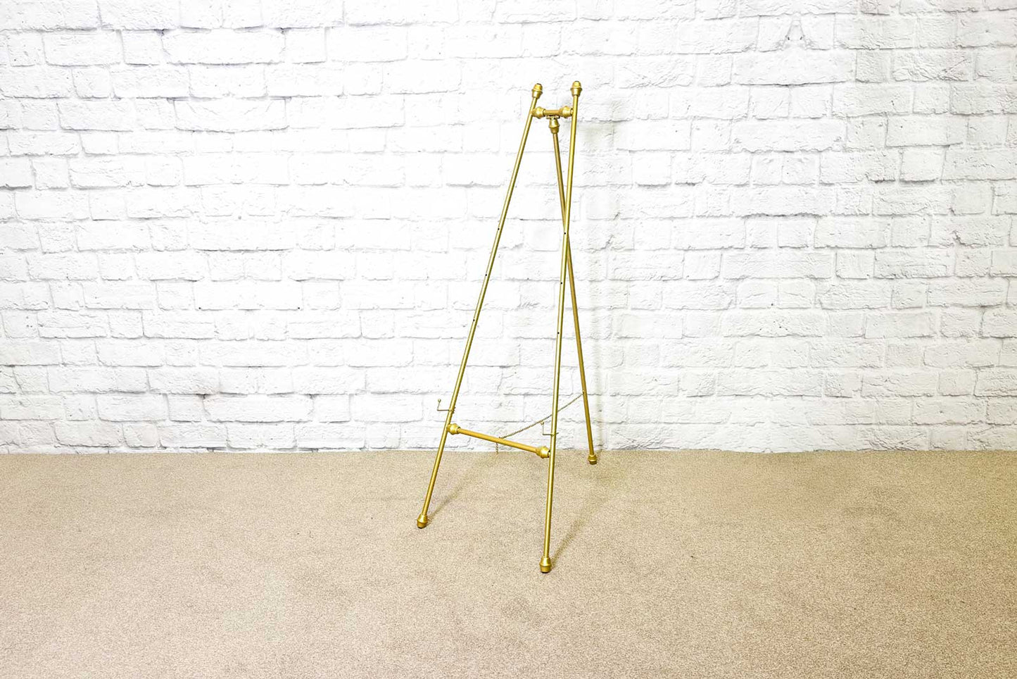 Gold easel for wedding signs and artwork