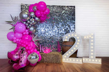 Load image into Gallery viewer, Decorative setup with pink and silver balloons and a large number &#39;21&#39; against a disco ball backdrop.
