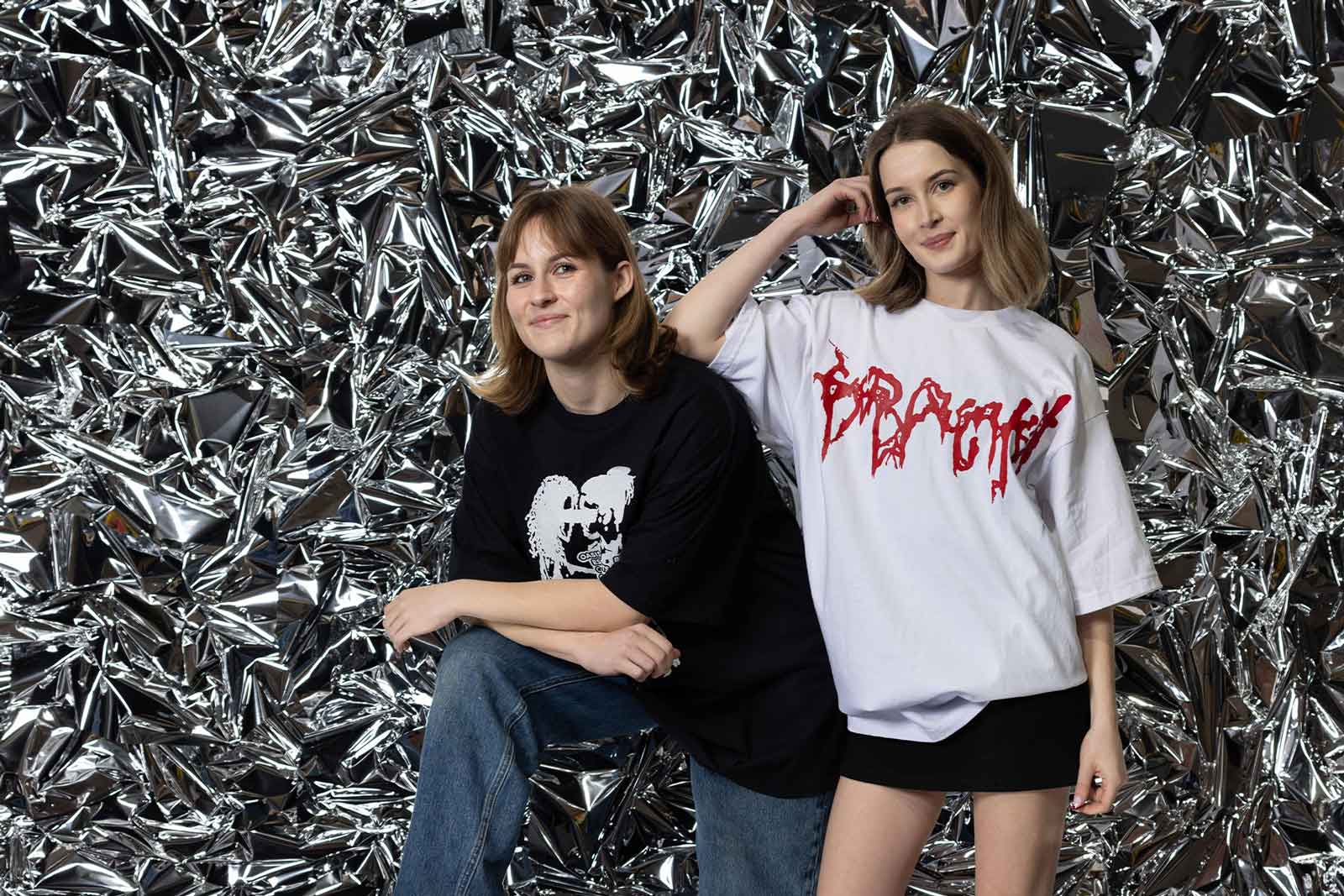 Silver crinkle foil wall used as a modern corporate photo and media backdrop