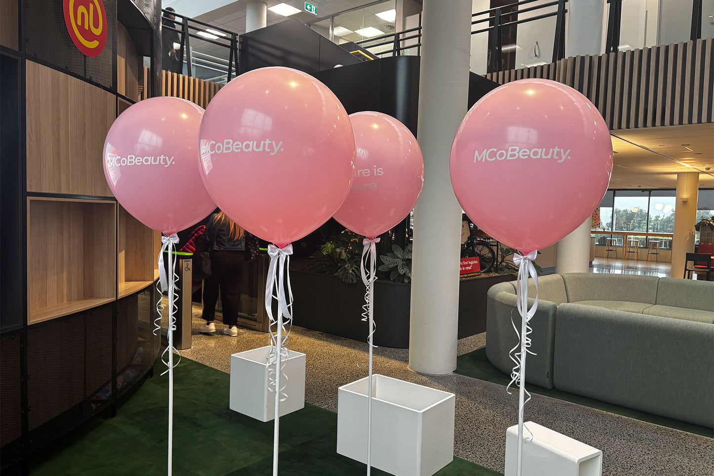 Air filled jumbo balloon on stand in Auckland, perfect for event entrances, birthdays, and corporate displays
