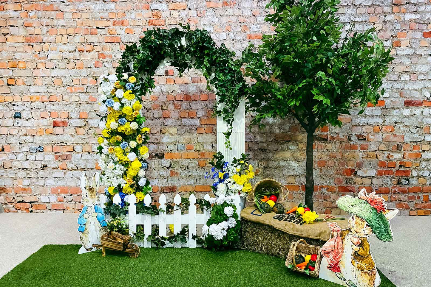 Artificial flower arrangements for hire to style tables, arches, and décor features