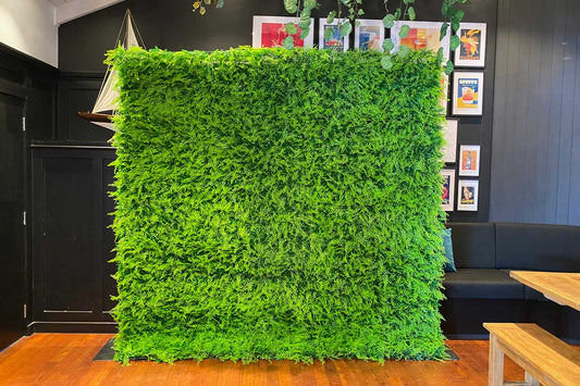 Green wall backdrop NZ used for event styling and branded photo areas, soccer, baby shower, tropical
