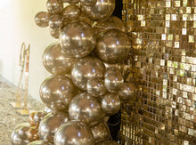 Load image into Gallery viewer, Shimmer wall and balloon garland creating a stylish backdrop for an Auckland corporate event.
