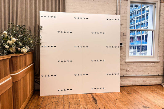 Branded corporate media wall in Auckland used for company events, photo opportunities, and professional brand exposure.