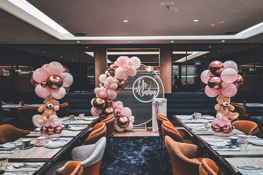 Elegant baby shower balloon garland and decorations for a special celebration in Auckland.