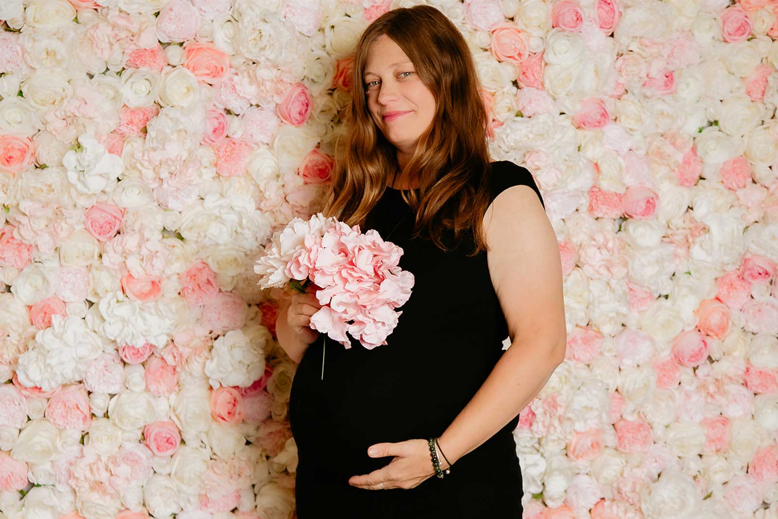 Soft pastel flower wall backdrop for baby shower celebrations