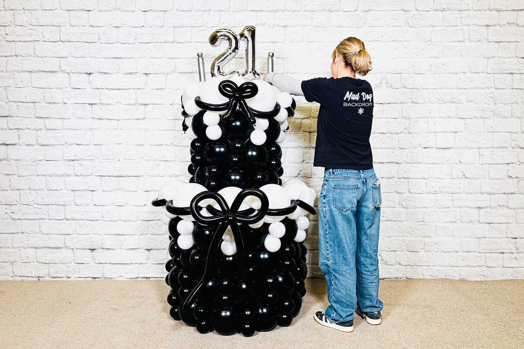 Balloon cake display for events and celebrations, stylish balloon arrangement available in Auckland