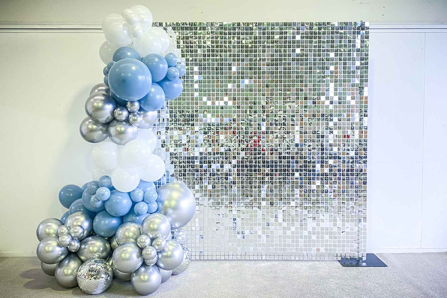 Statement balloon garland on shimmer wall for venue entrances, photo walls, and event styling in Auckland