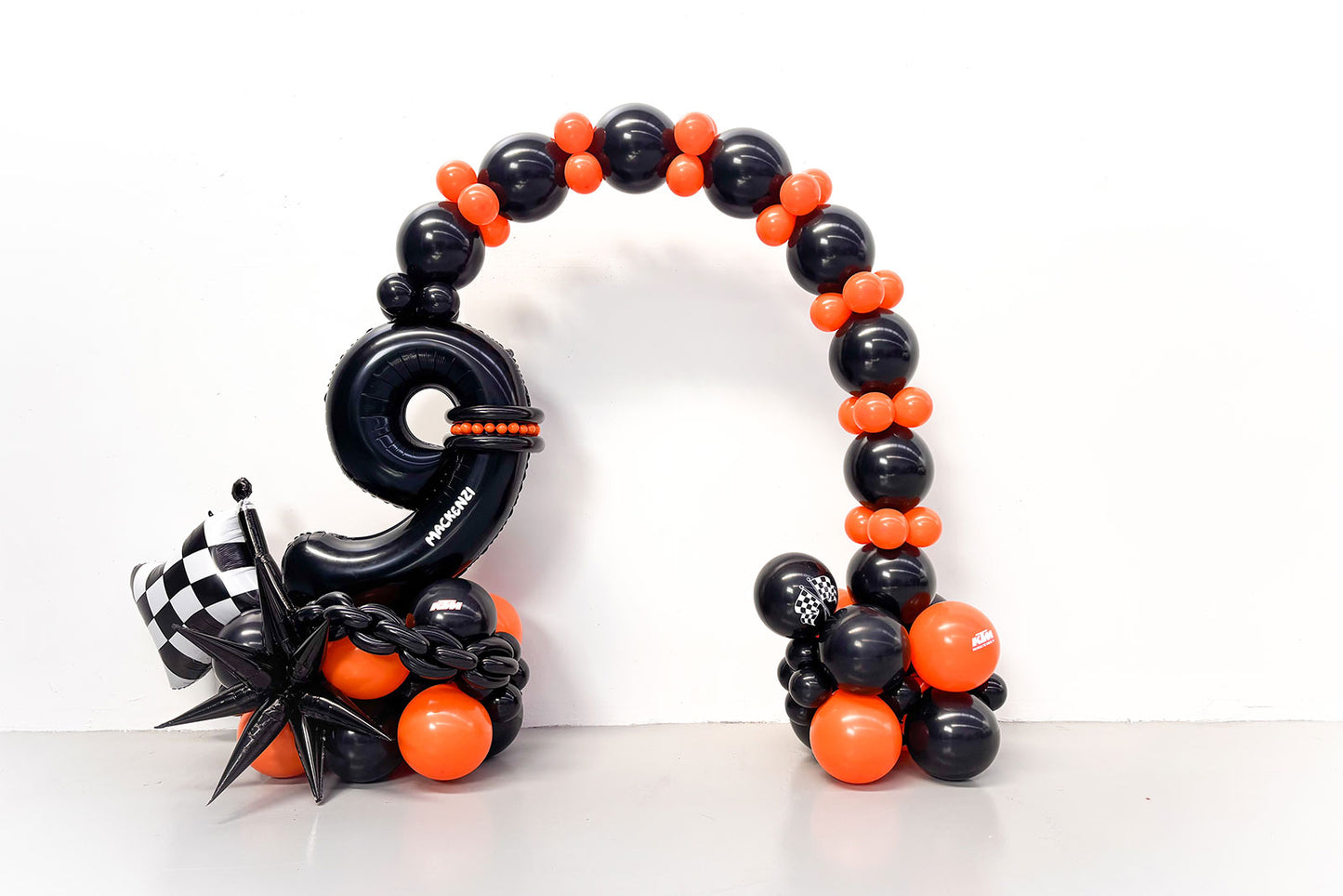 Balloon number arch backdrop in Auckland for birthdays and events