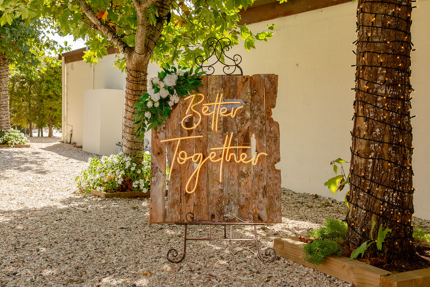 Better Together neon sign on easel for weddings, engagements, or romantic events