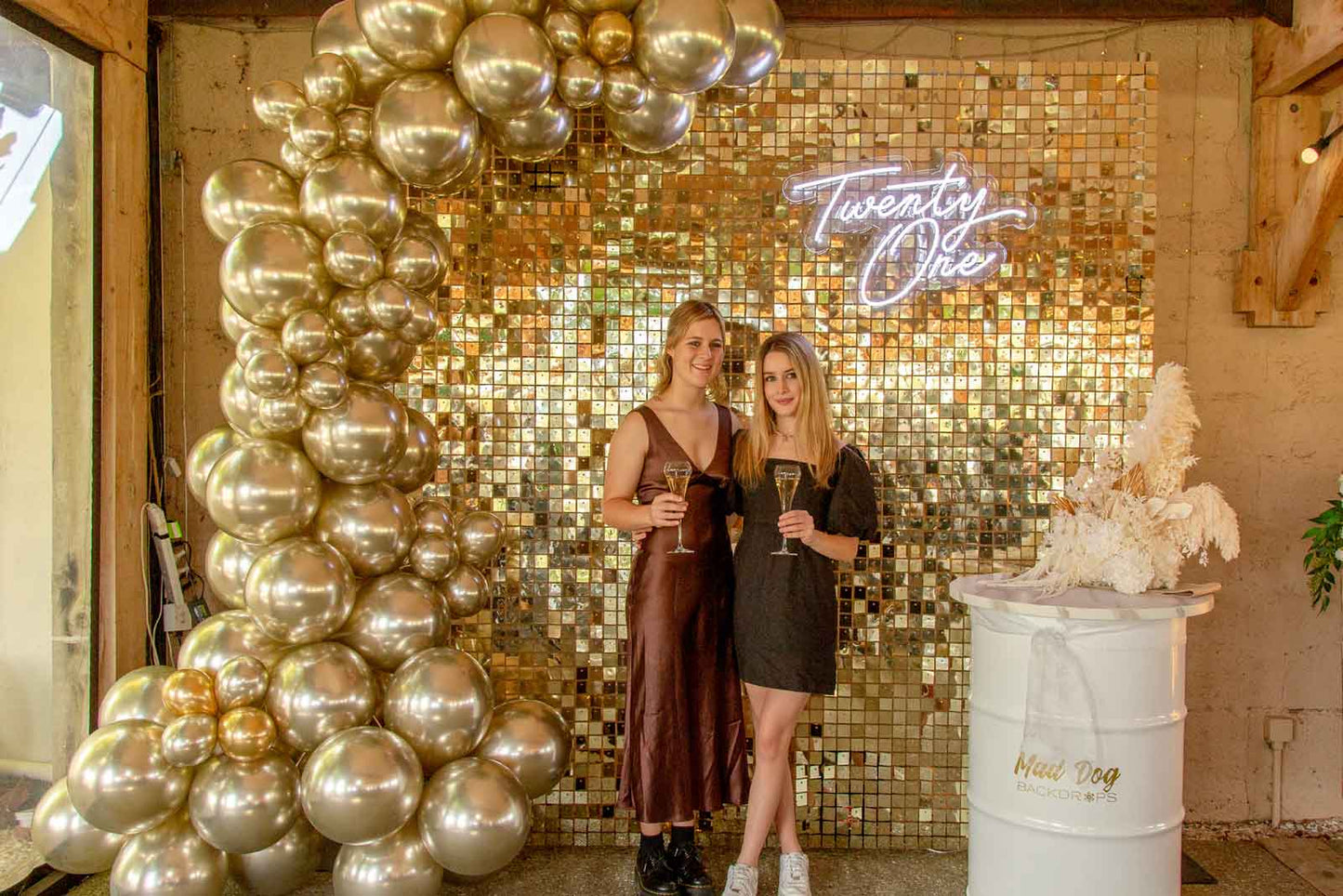 Birthday shimmer wall backdrop with premium sequin panels, balloon garland and luxury event styling for celebrations in Auckland, NZ.