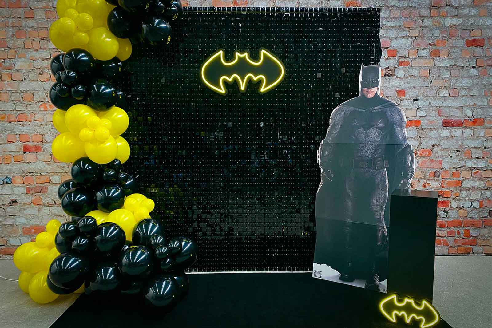 Black shimmer wall photo backdrop for a modern birthday event in Auckland