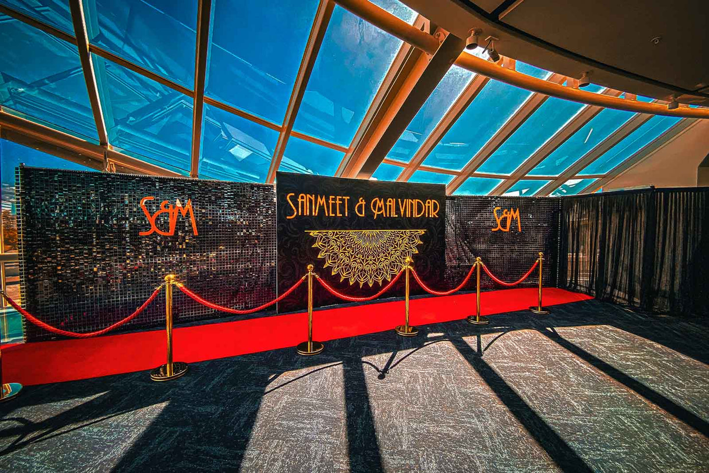 Elegant black shimmer wall backdrop for weddings and receptions in Auckland