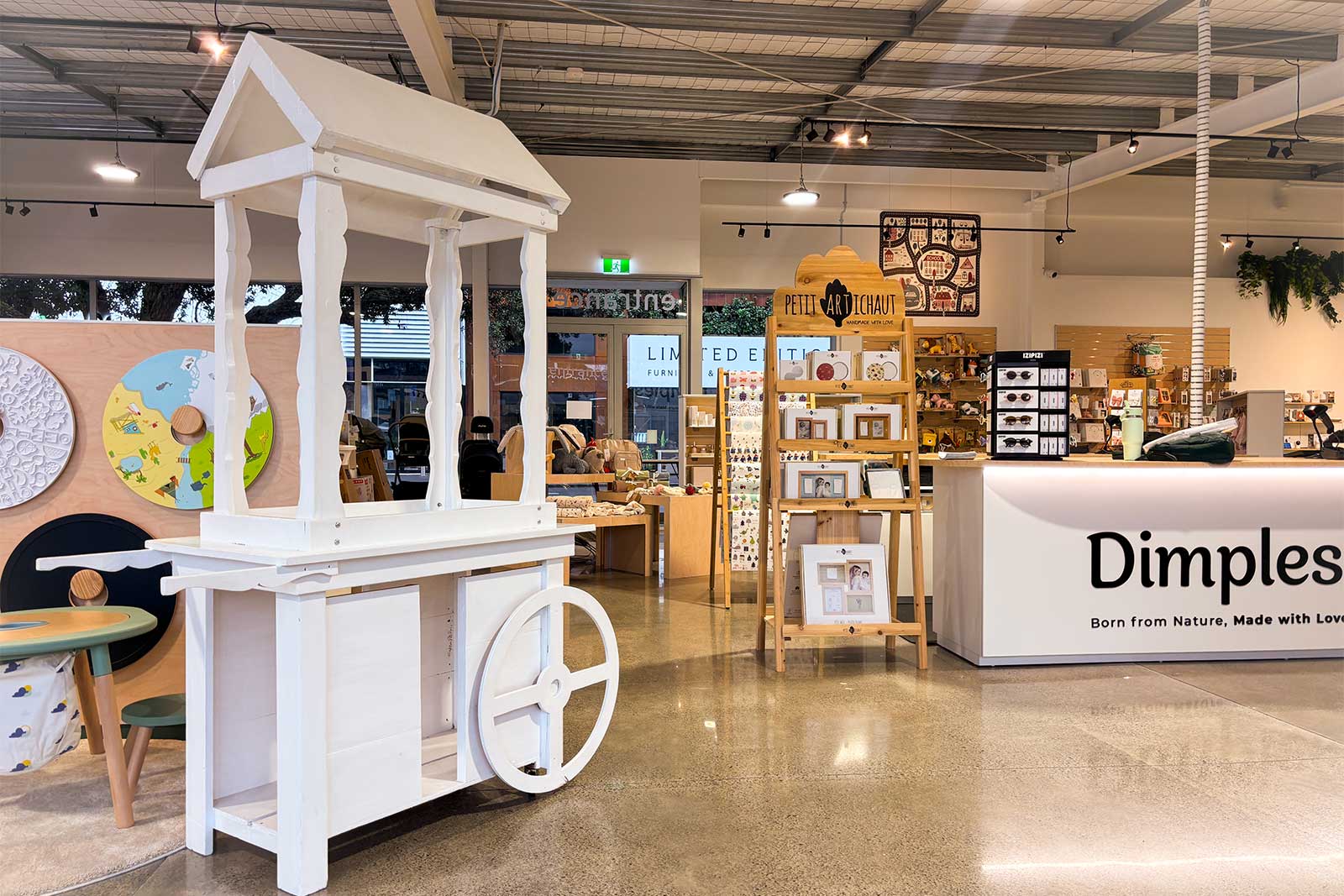 Styled candy cart with sweets and branding for a corporate function in Auckland