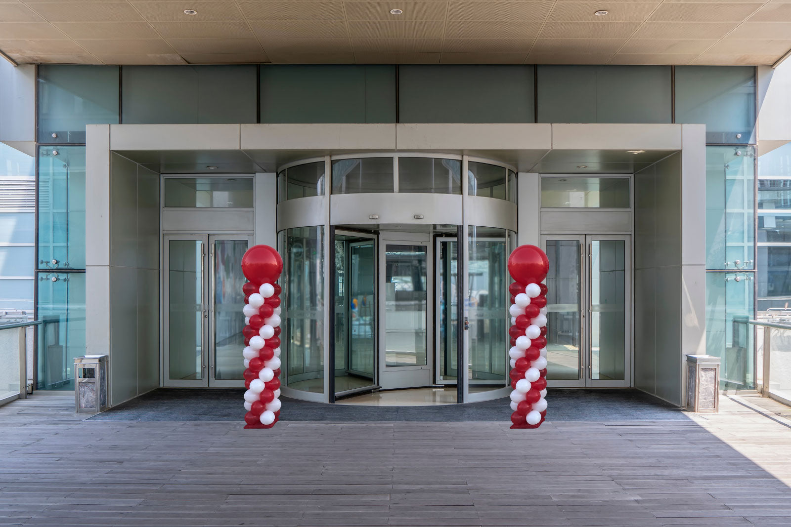 Colourful spiral balloon column arrangement used for party or corporate event styling and entrance decoration