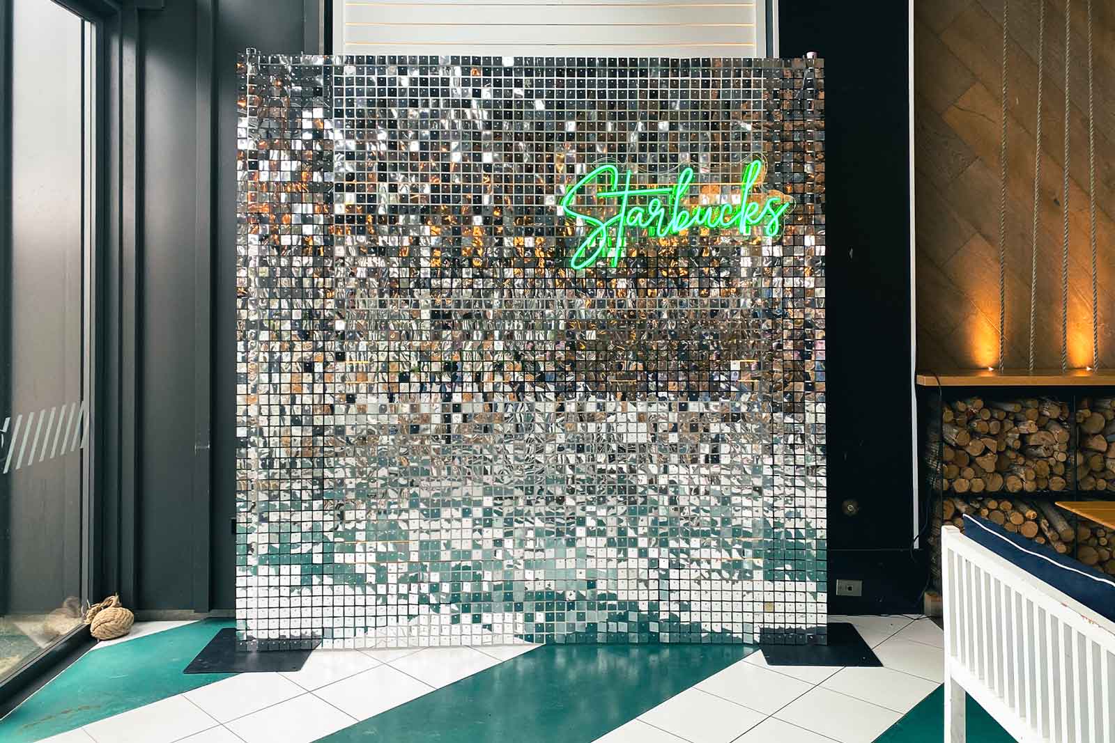 Corporate event photo wall featuring a silver shimmer backdrop