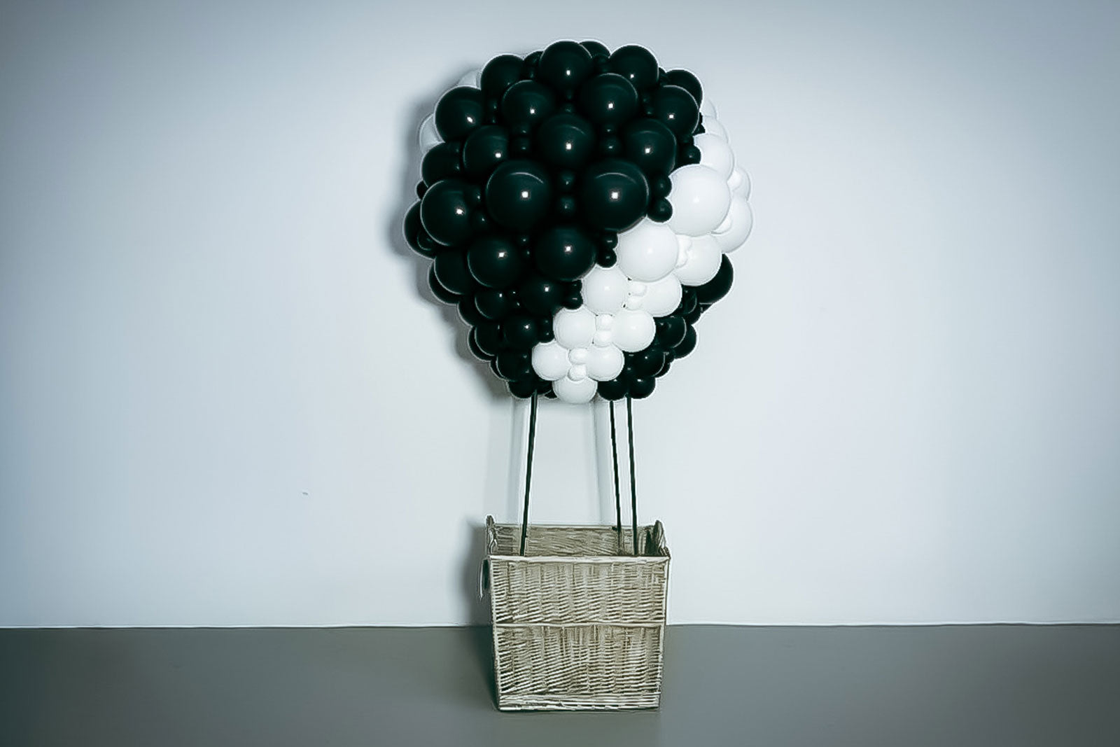 Custom hot air balloon sculpture made from balloons for a party entrance or event styling feature.