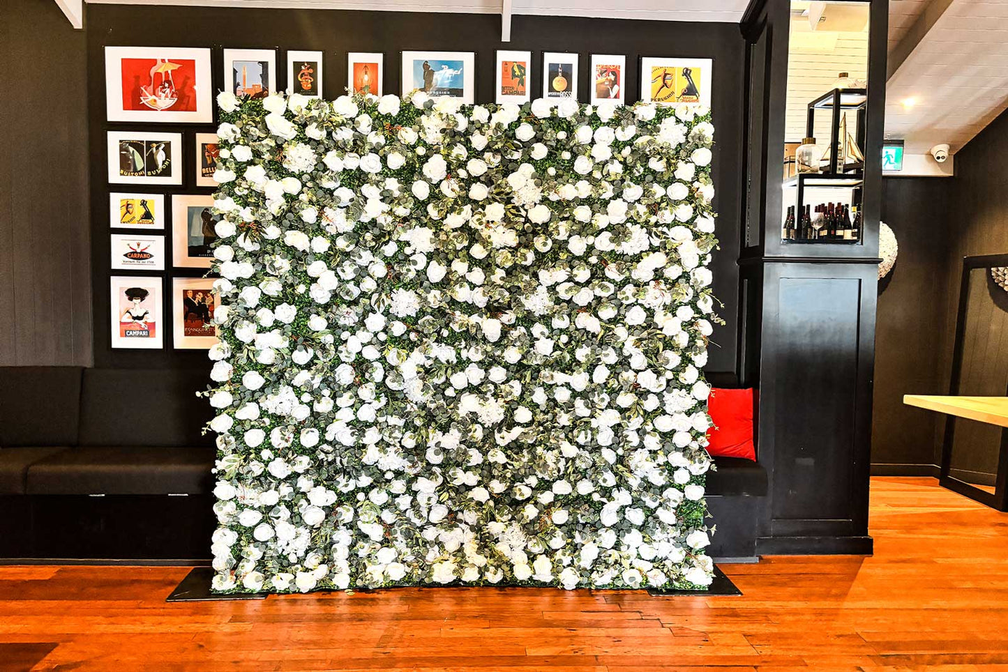 Custom wedding flower wall backdrop with lush, realistic blooms