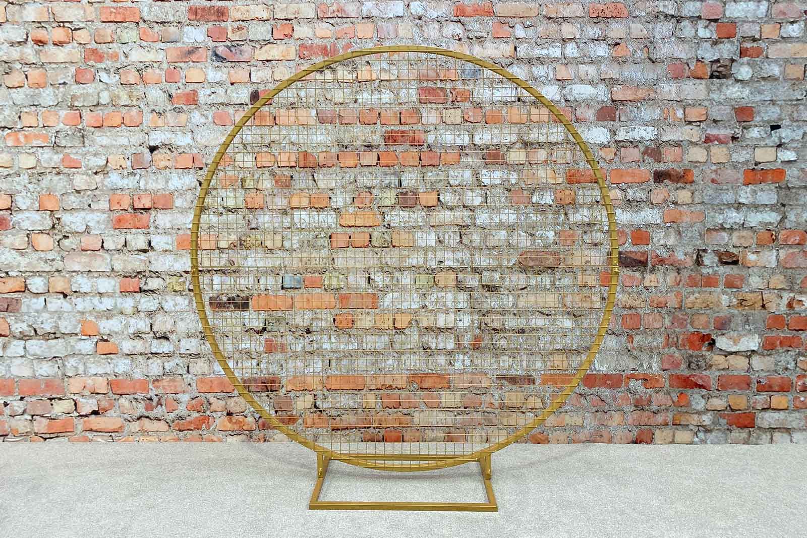 Decorative gold mesh circle backdrop for photo displays and celebrations