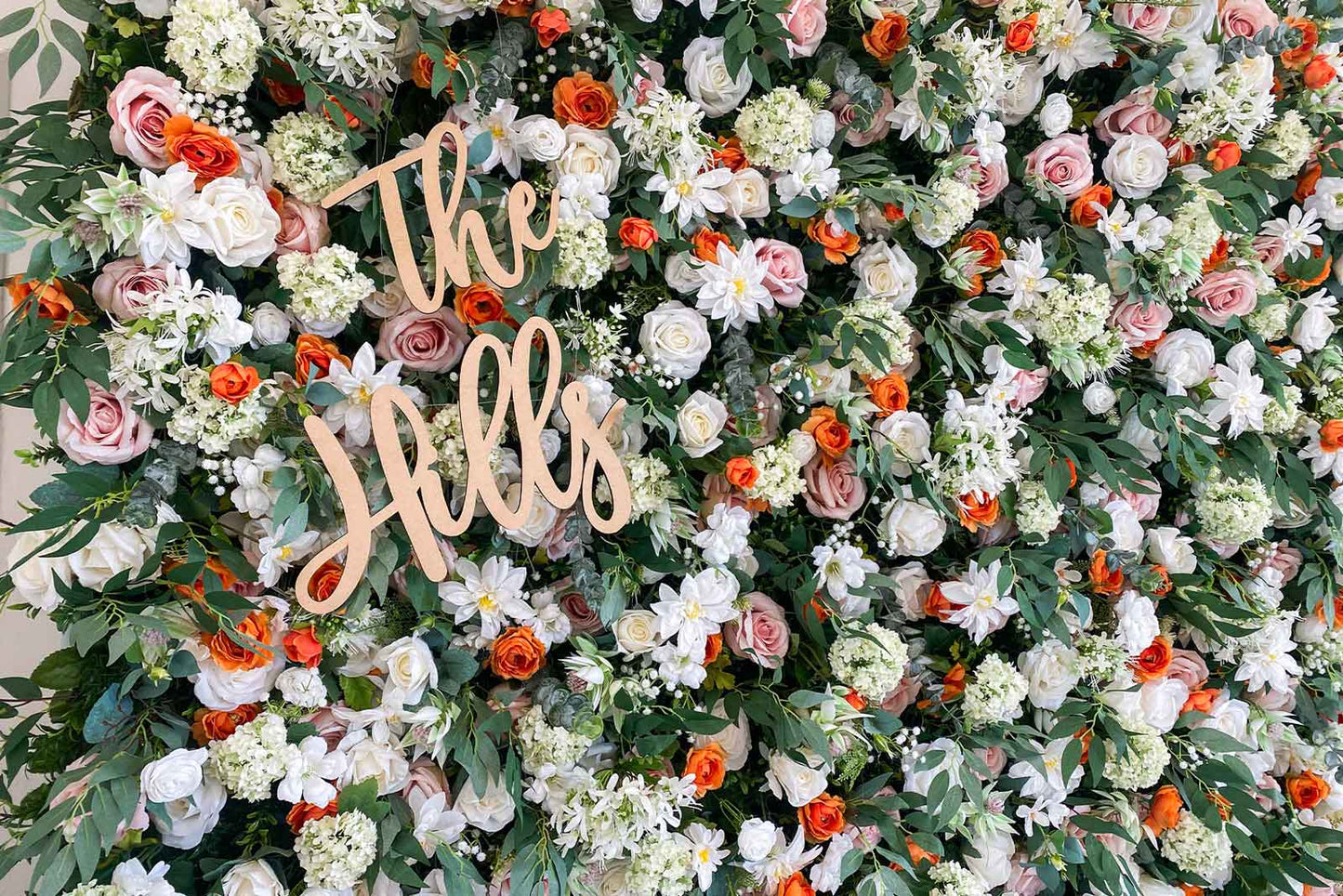 Elegant floral wall for wedding reception and photo booth