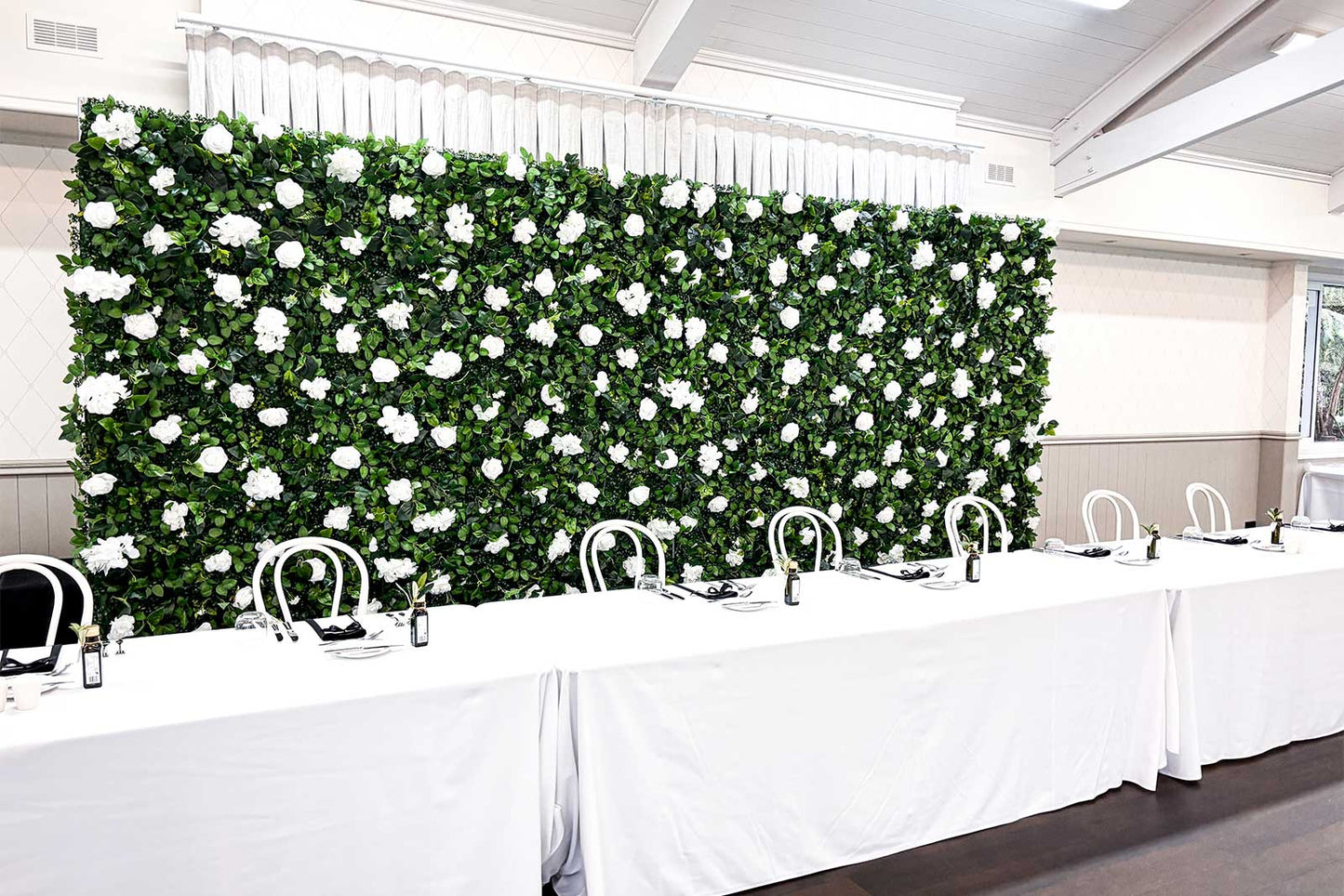Luxury flower wall backdrop for wedding ceremony and reception hire in Auckland, New Zealand.
