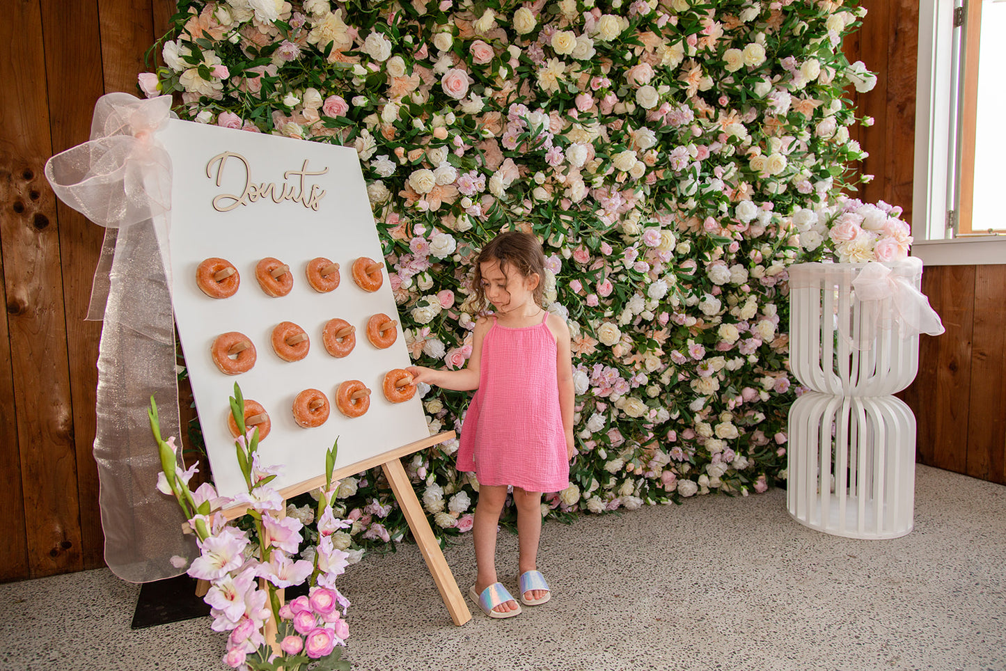 Full-size floral wall backdrop for event styling