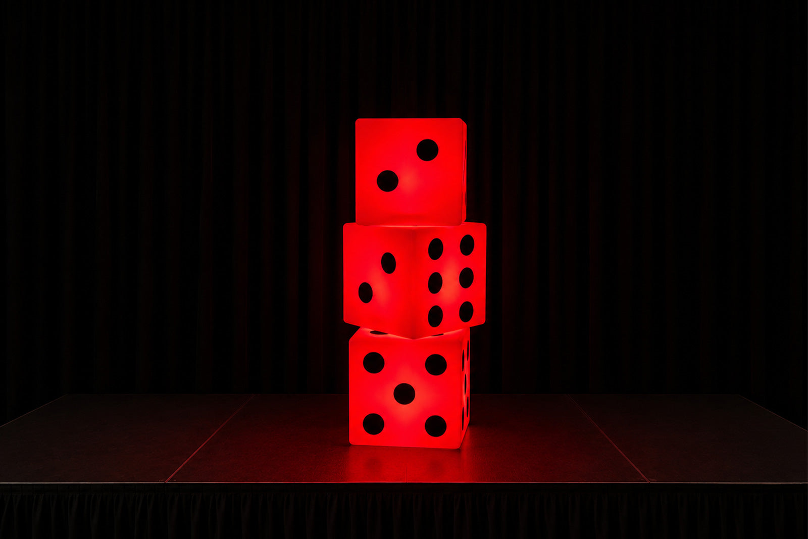 Giant LED illuminated dice prop for hire, ideal for creating eye-catching event décor at corporate launches, themed parties, birthdays, exhibitions, and promotional events across New Zealand.