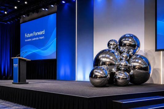 Giant silver inflatable balls creating a stylish display for event styling, balloon décor and venue decoration.