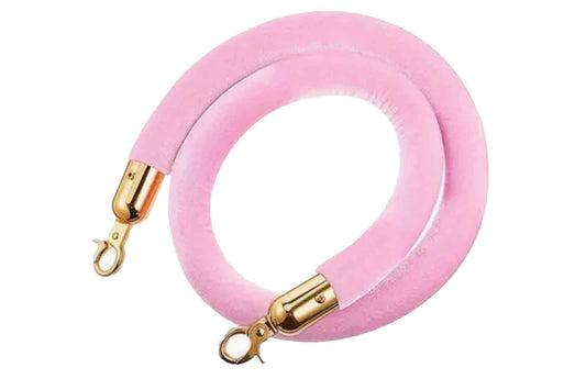 Gold stanchions with pink rope for hire, perfect for parties, weddings, and event entrances