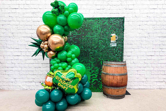 Green shimmer wall backdrop creating a vibrant and elegant photo area for events