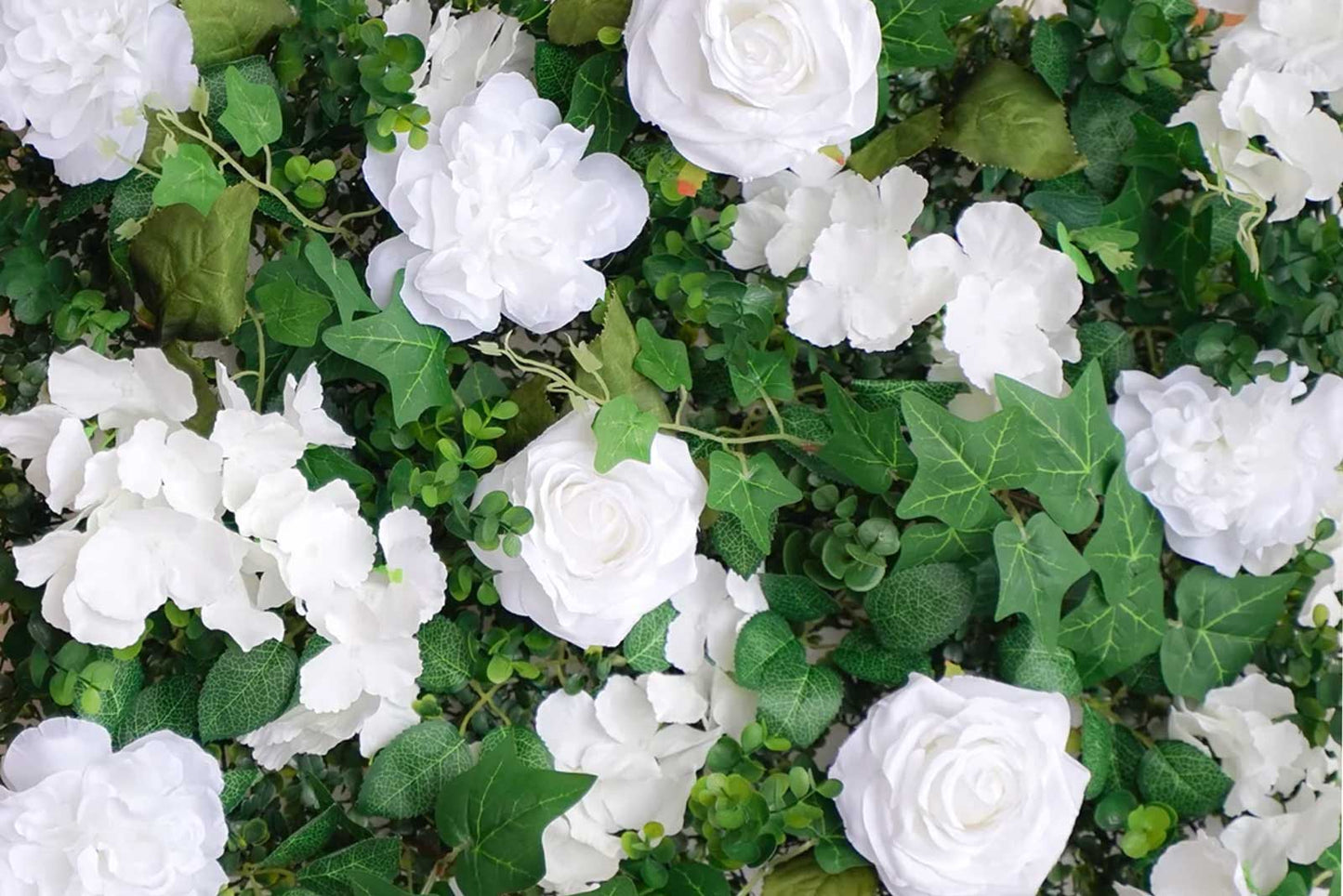 Green and white flower wall backdrop for corporate events and branding