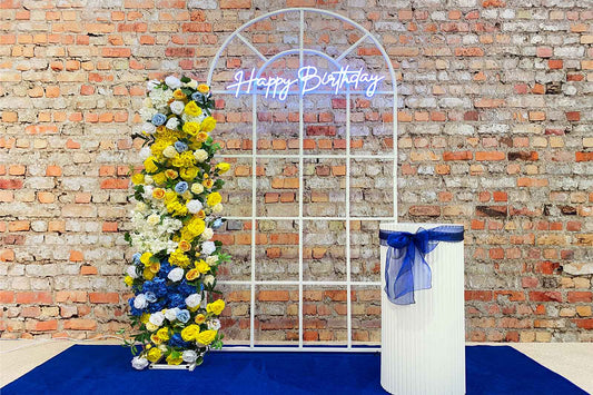 Happy Birthday backdrop with elegant floral arrangements and premium event styling for birthdays and milestone celebrations in Auckland, NZ.