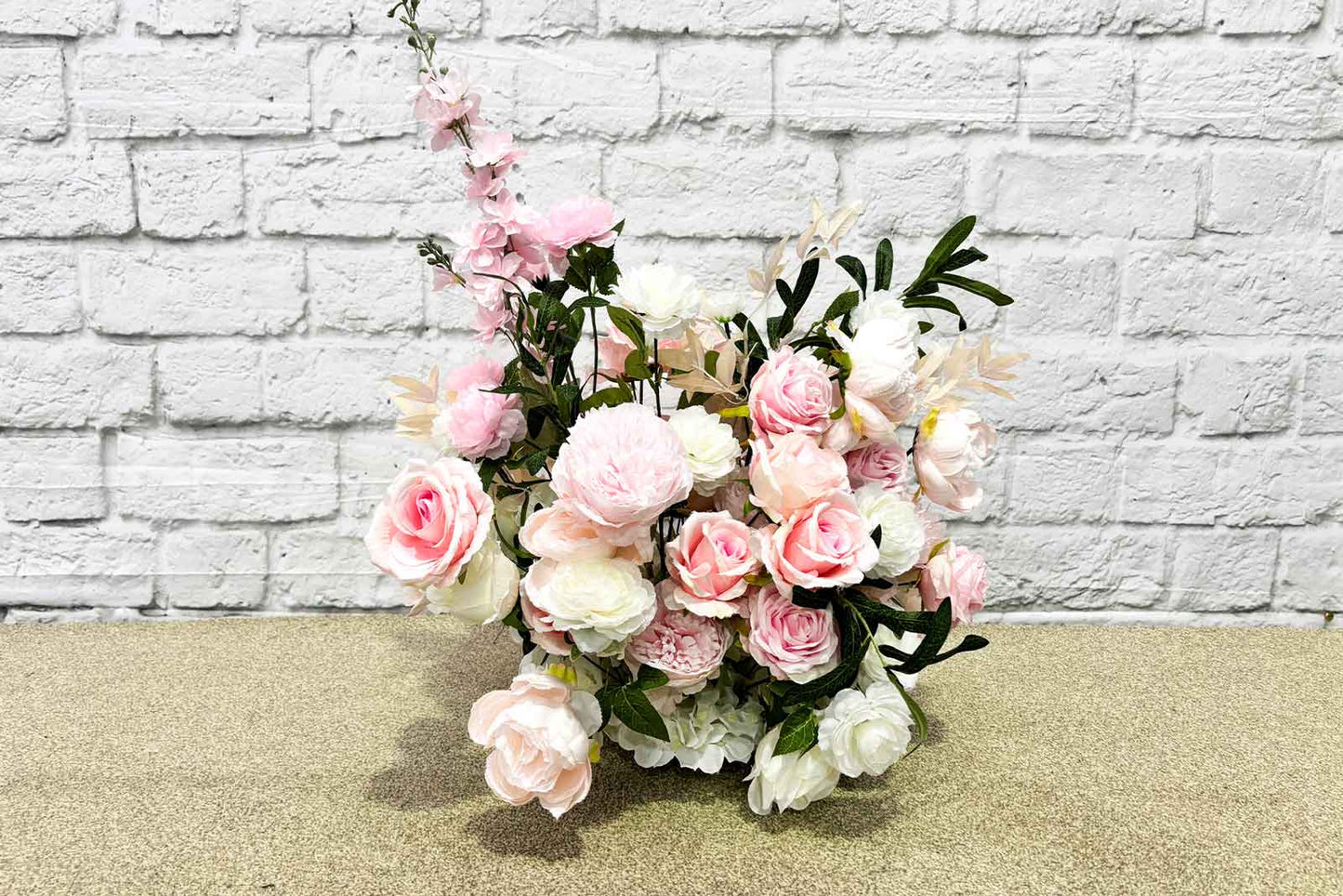 Hire artificial flowers for birthday décor, photo walls, and party styling