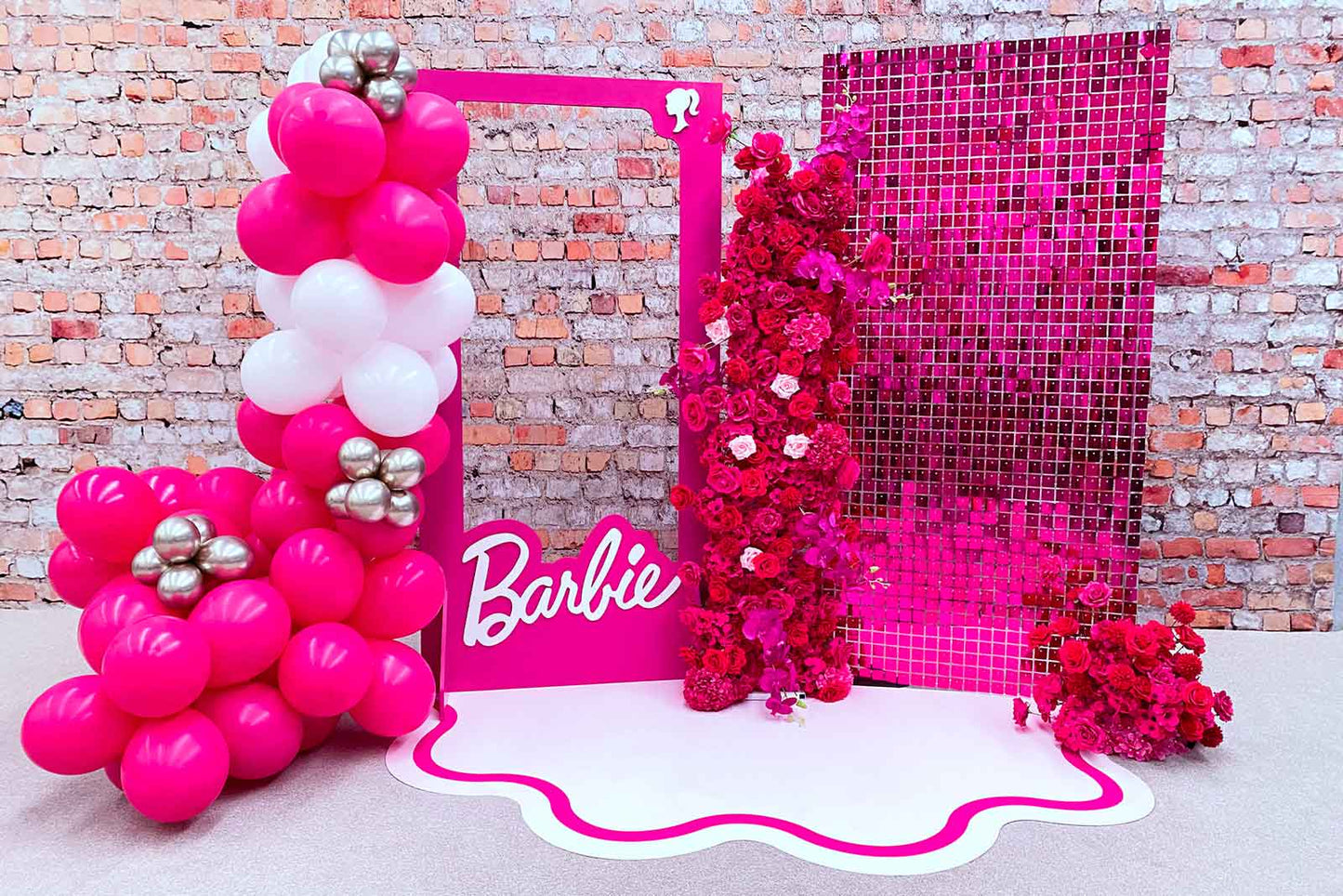 Hot pink shimmer wall hire adding a bold and festive touch to birthday celebrations