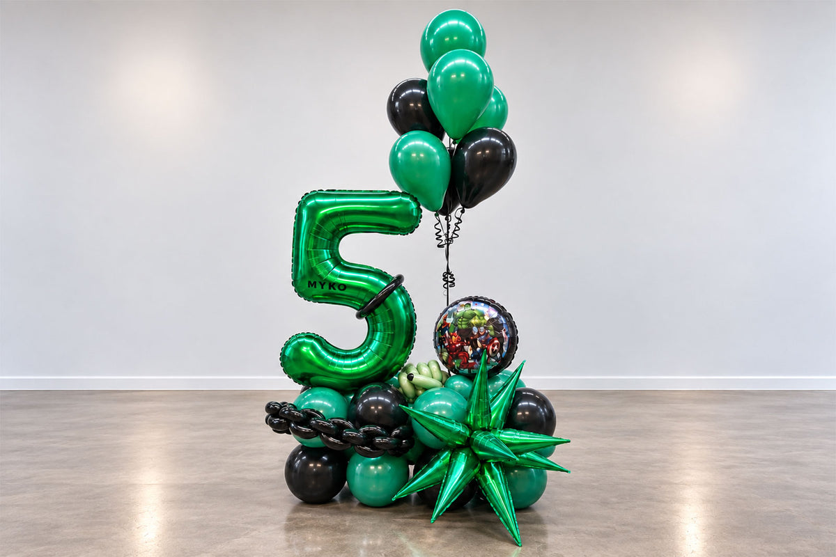 Hulk-themed balloon number stack with green and purple balloons for a birthday celebration