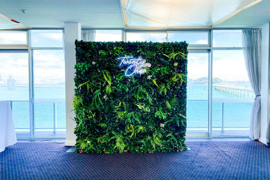 Jungle greenery 21st wall backdrop for hire in Auckland, ideal for photo booths and themed event styling