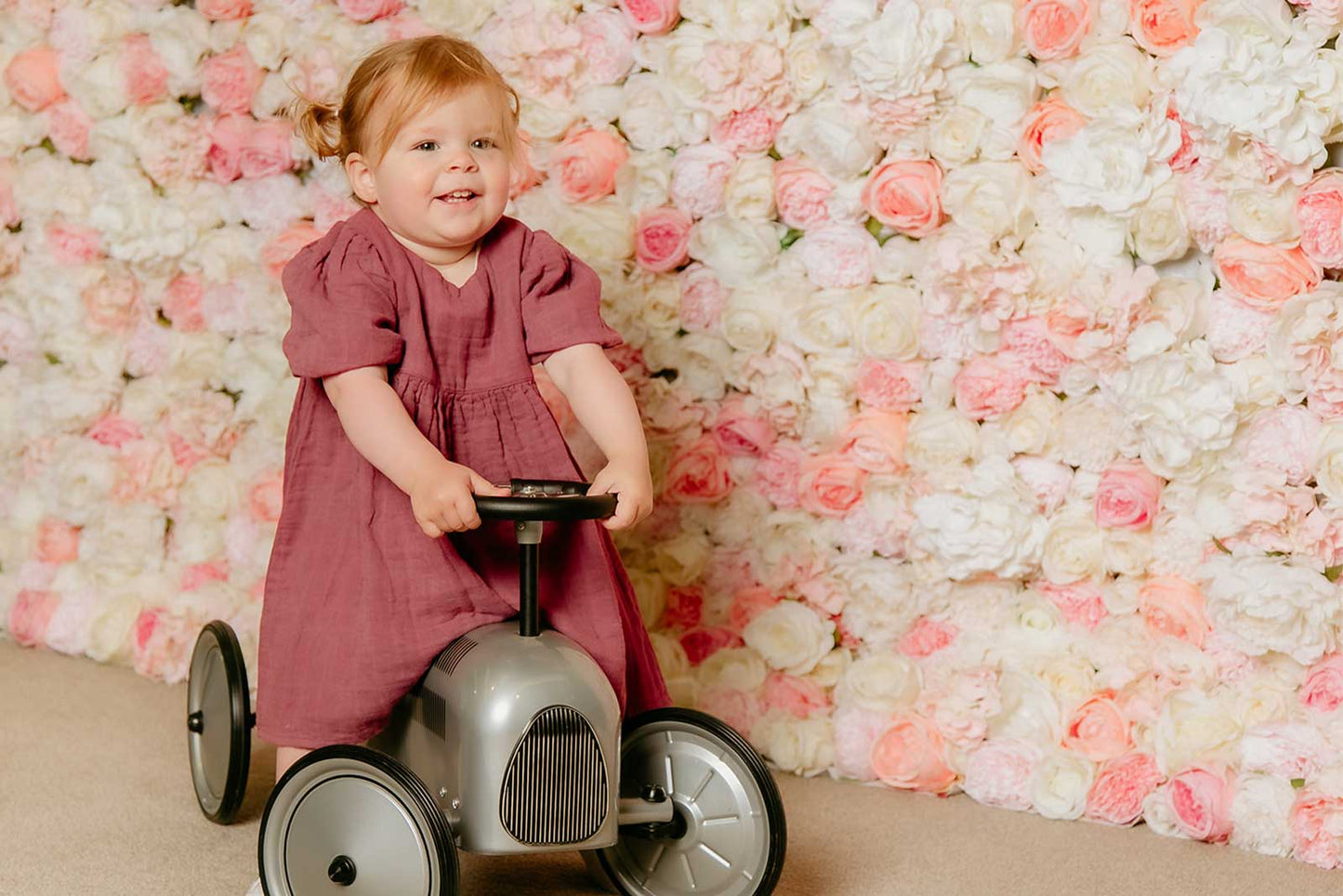 Bright and playful flower wall backdrop for kids’ birthday party celebration