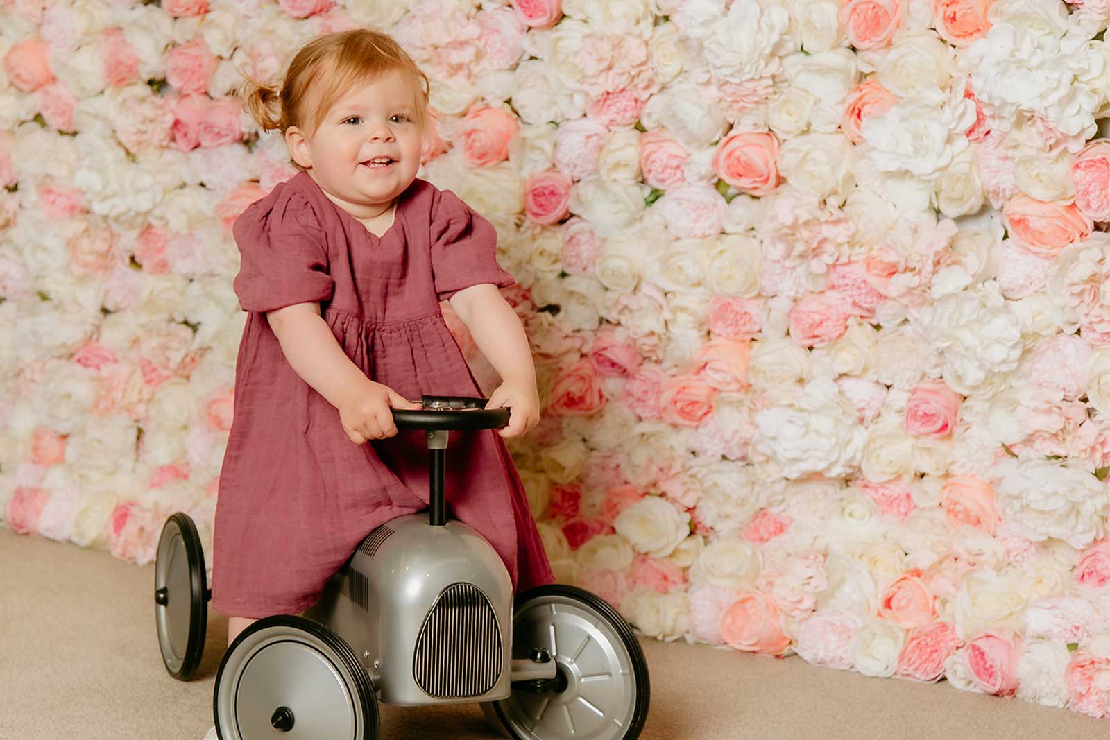 Bright and playful flower wall backdrop for kids’ birthday party celebration