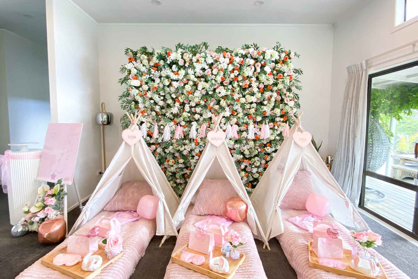 Bright and playful flower wall backdrop for children’s birthday party